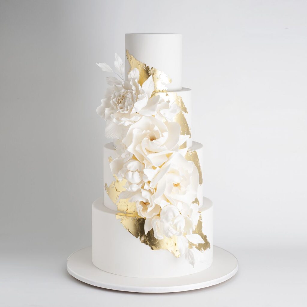 White and gold wedding cake